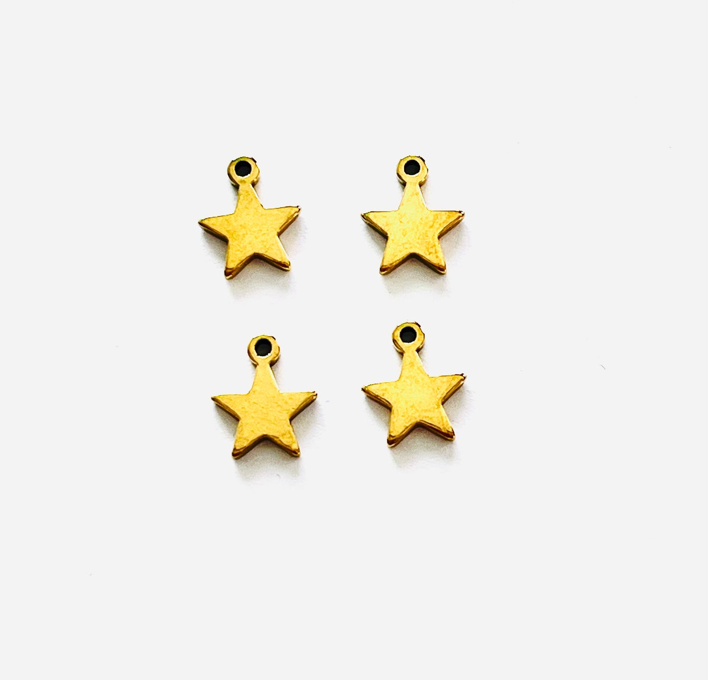 Colgante estrella 10x8mm acero inoxidable (4 unidades)