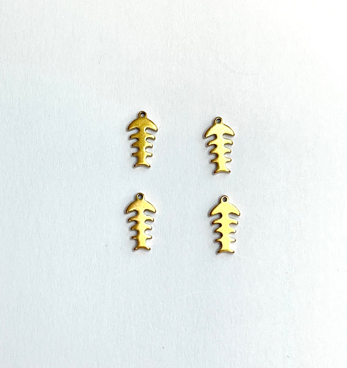 Colgante esqueleto pez 10x5mm (4unidades)