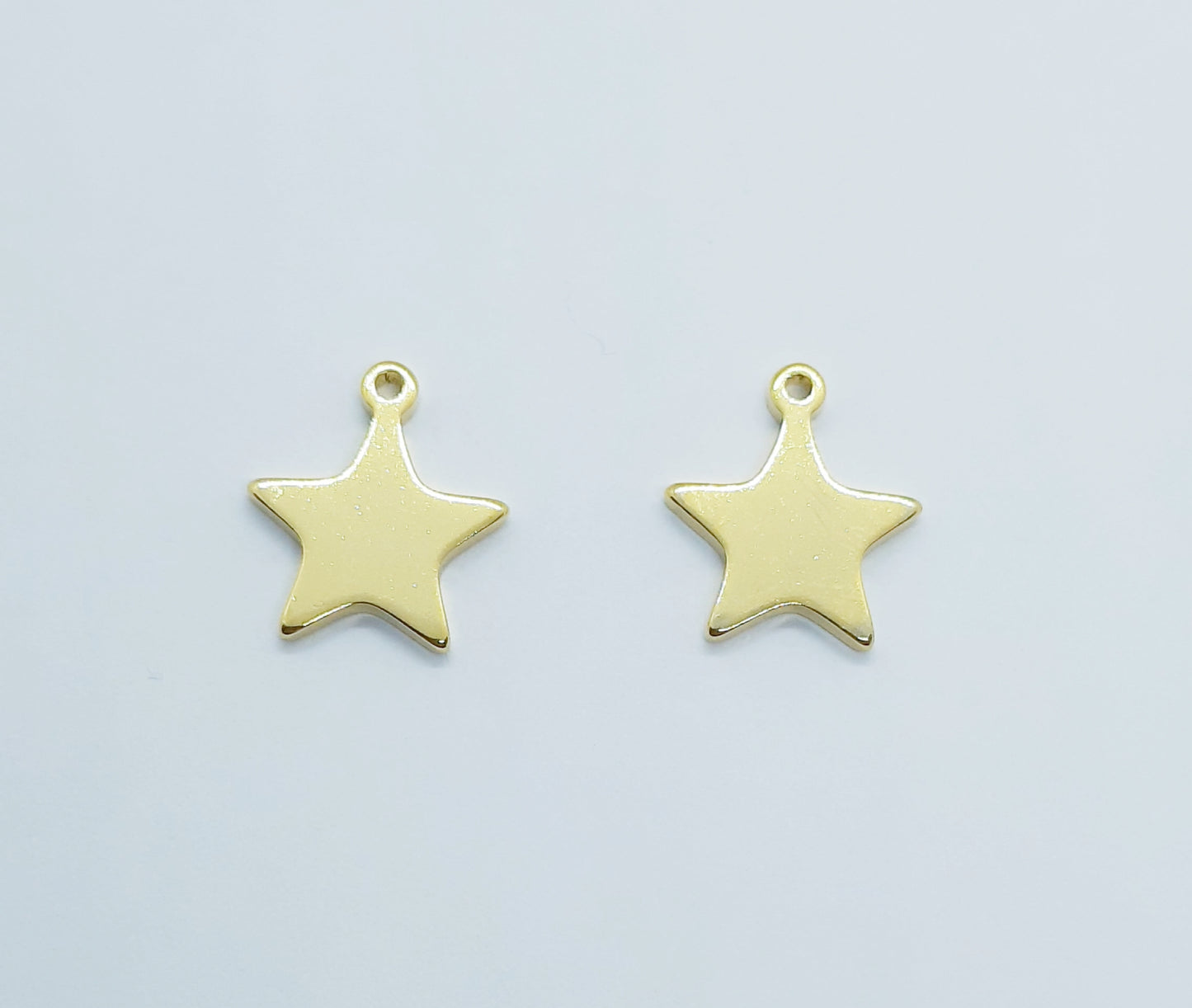 Colgante estrella 10x12mm (par)