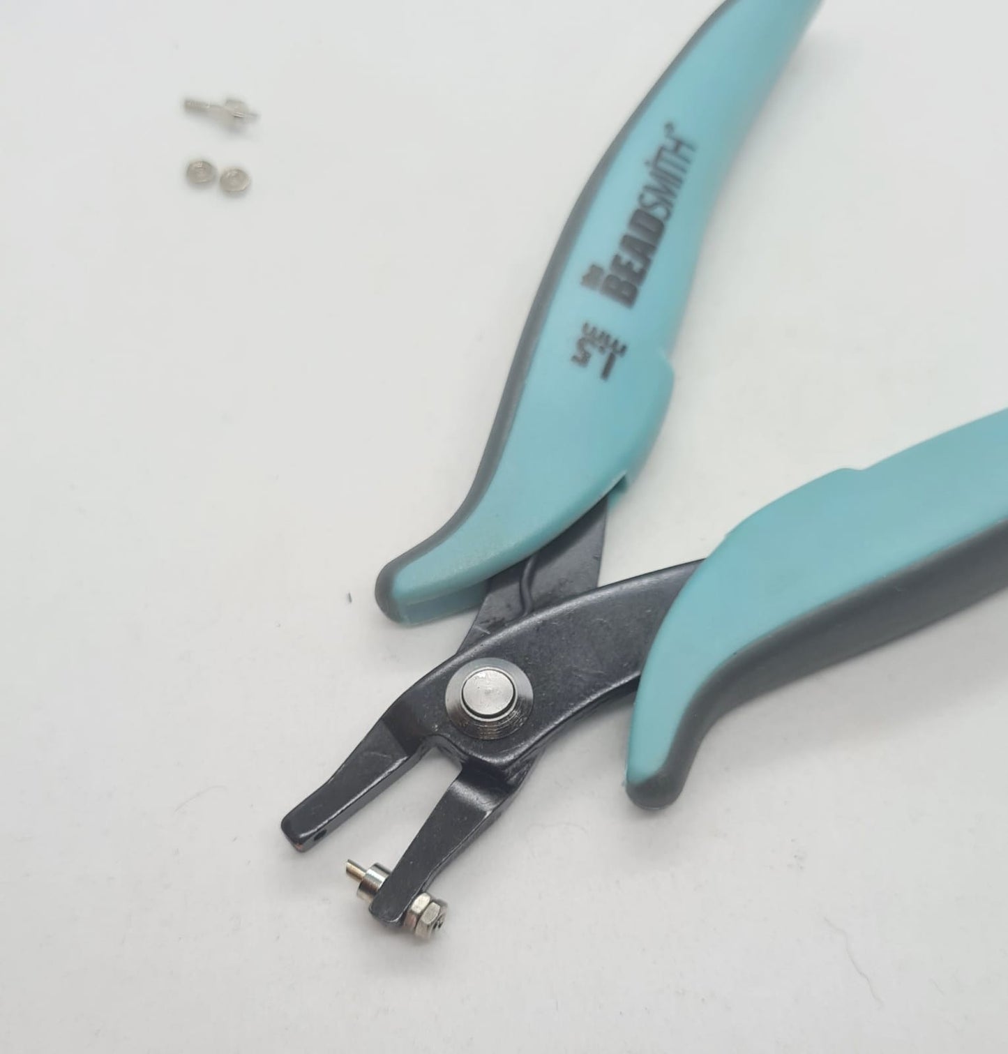 Alicate/pinza abre hueco