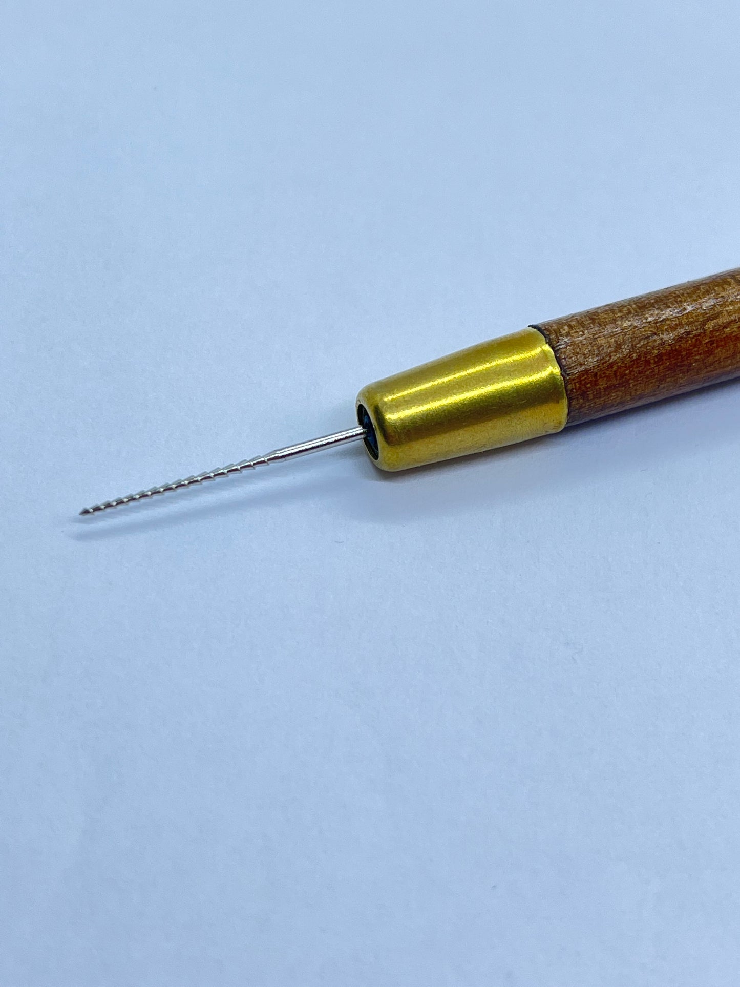 Escareador (abridor) de perlas